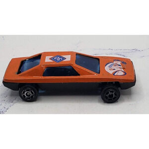 Diecast Orange Sports Car With Fish Theme on Hood
